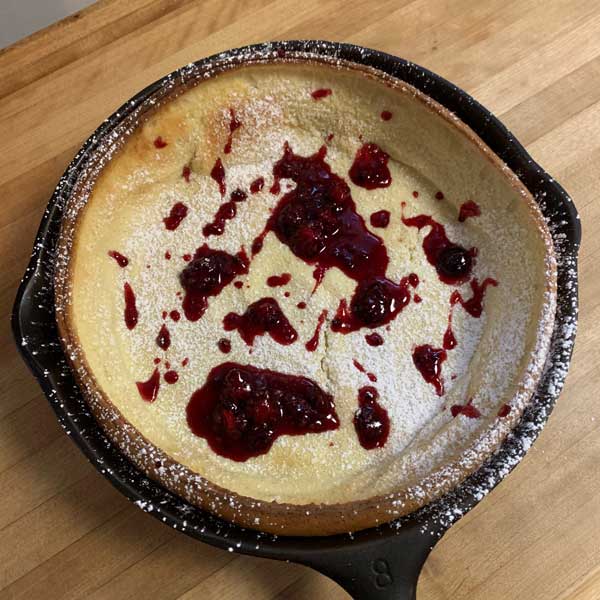 Dutch Baby with Black & Blueberry Sauce