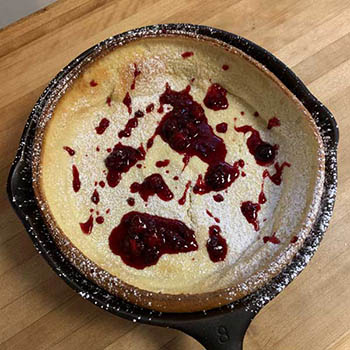 Dutch Baby with Black & Blueberry Sauce